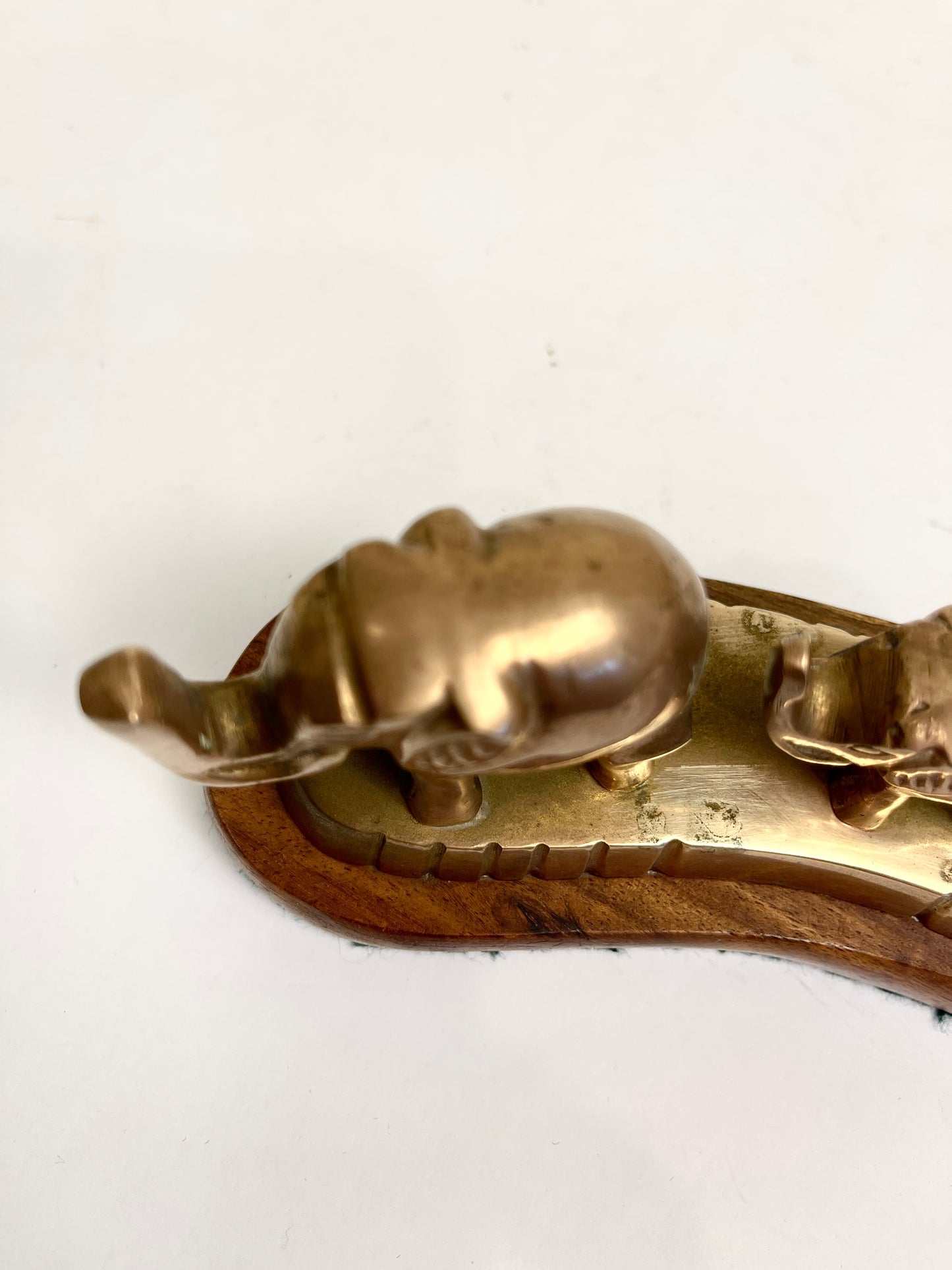 Vintage Brass Elephants on Curved Wood Base