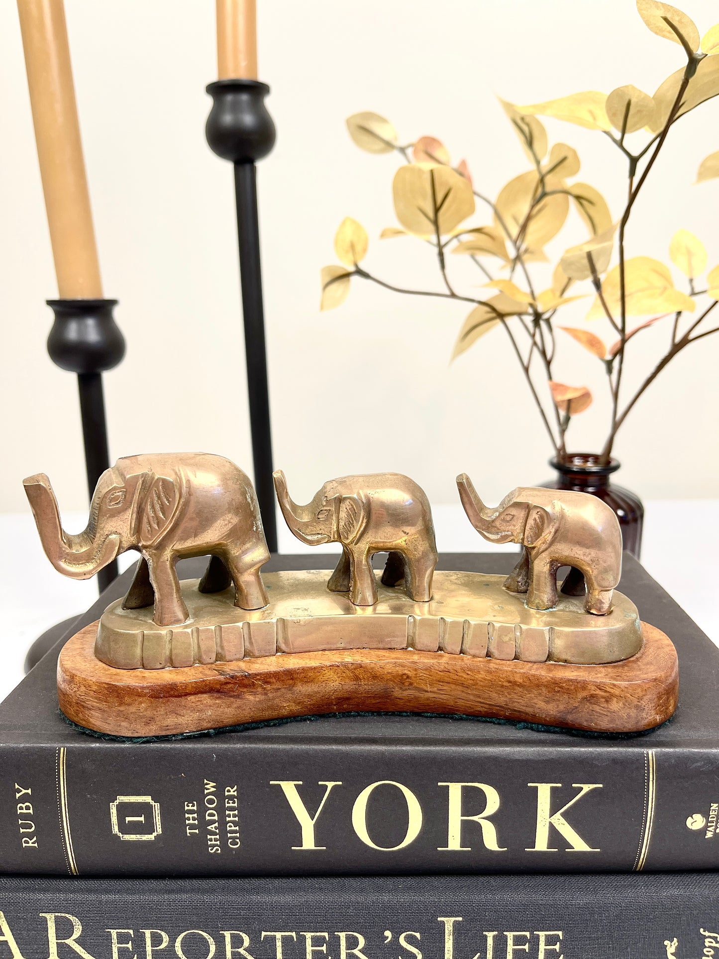 Vintage Brass Elephants on Curved Wood Base